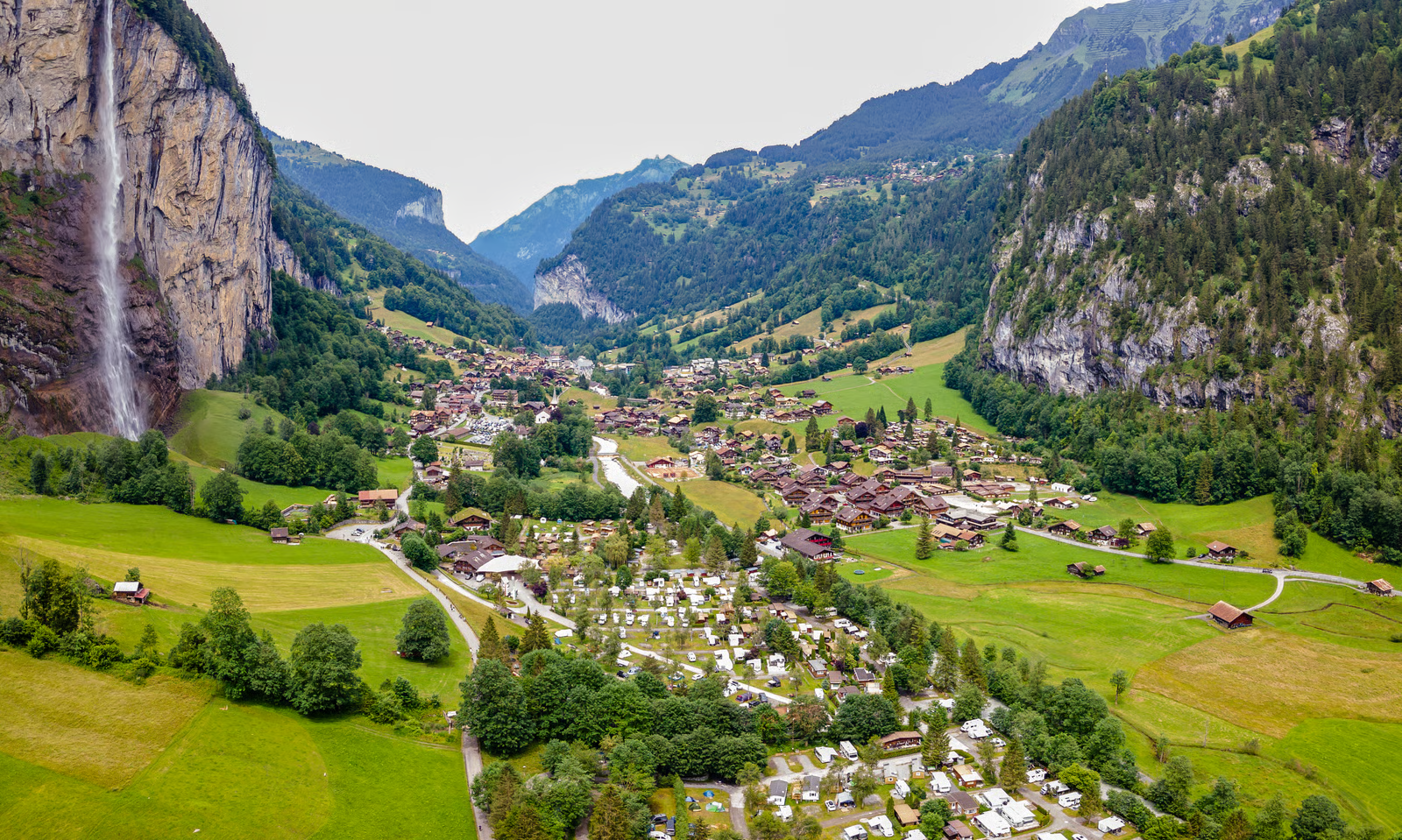 Lauterbrunnen Valley & Staubbach Falls Panoramic view of Lauterbrunnen Valley and Staubbach Falls, Switzerland